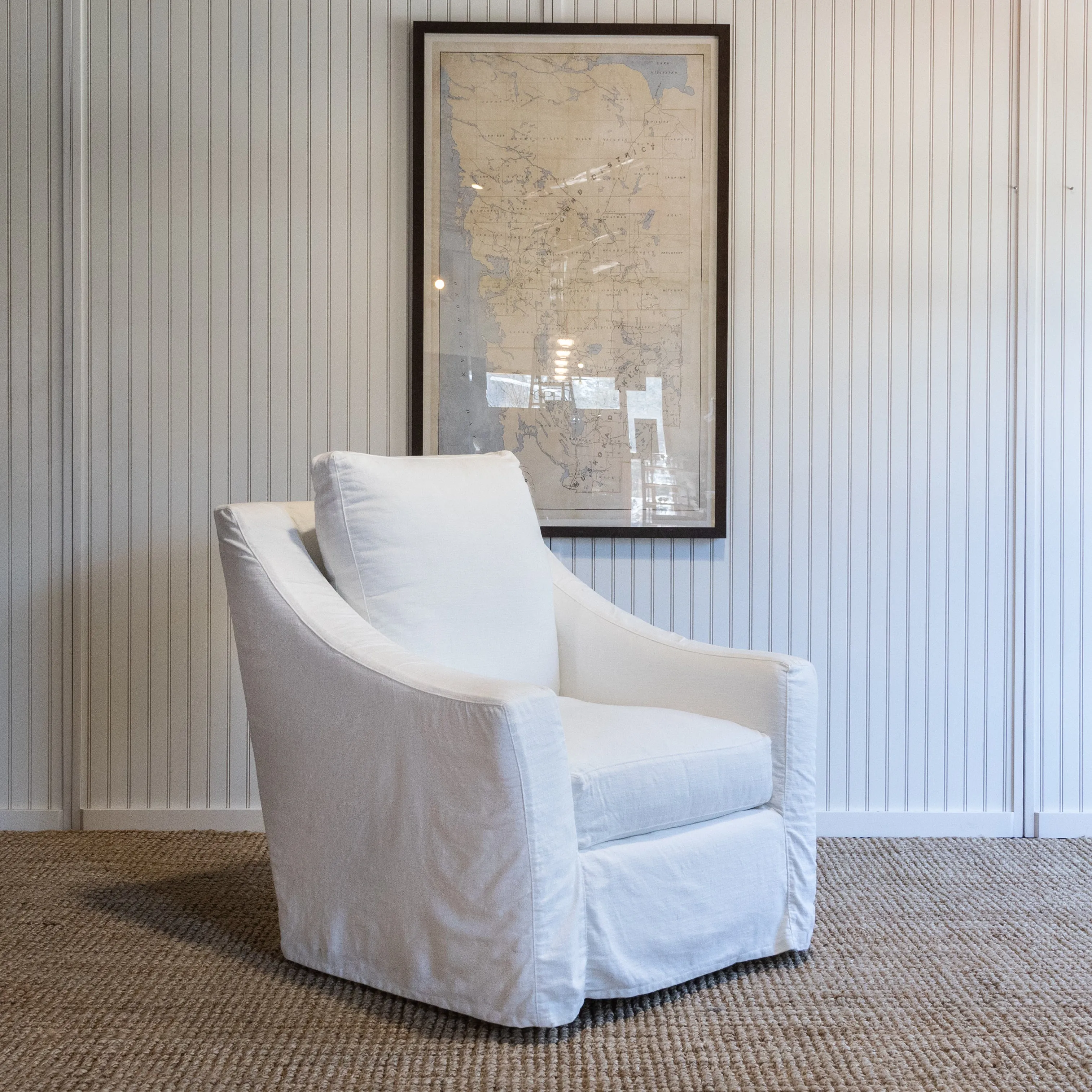 Peninsula Slipcovered Swivel Glider