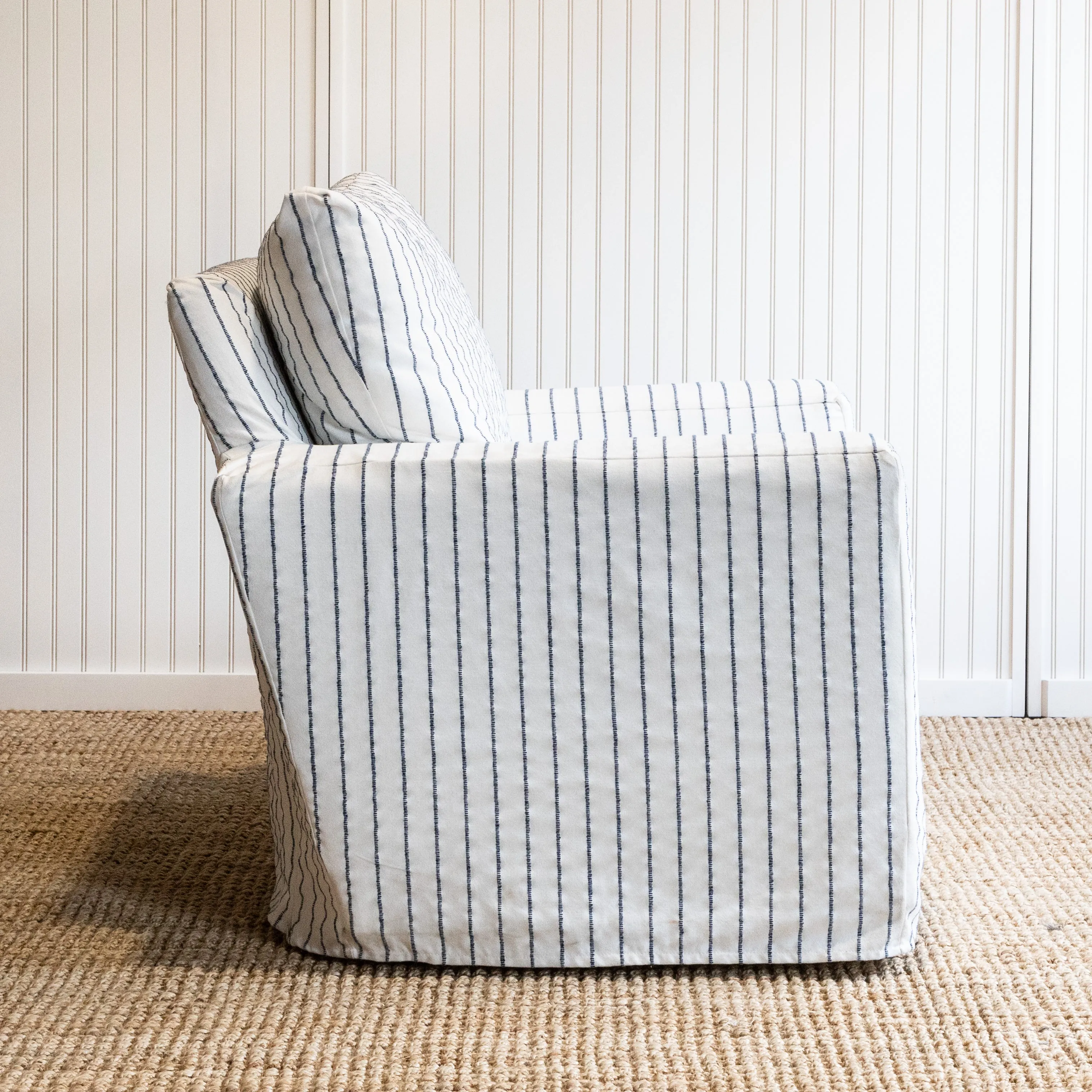 River Slipcovered Swivel Chair